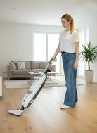 Lindhaus Valzer Digital cordless vacuum cleaning a hardwood floor