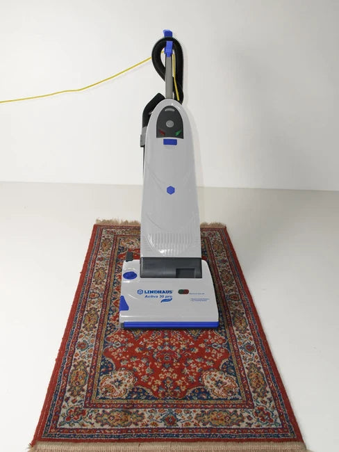 Lindhaus Activa 30 Pro Eco Force vacuuming carpets and rugs